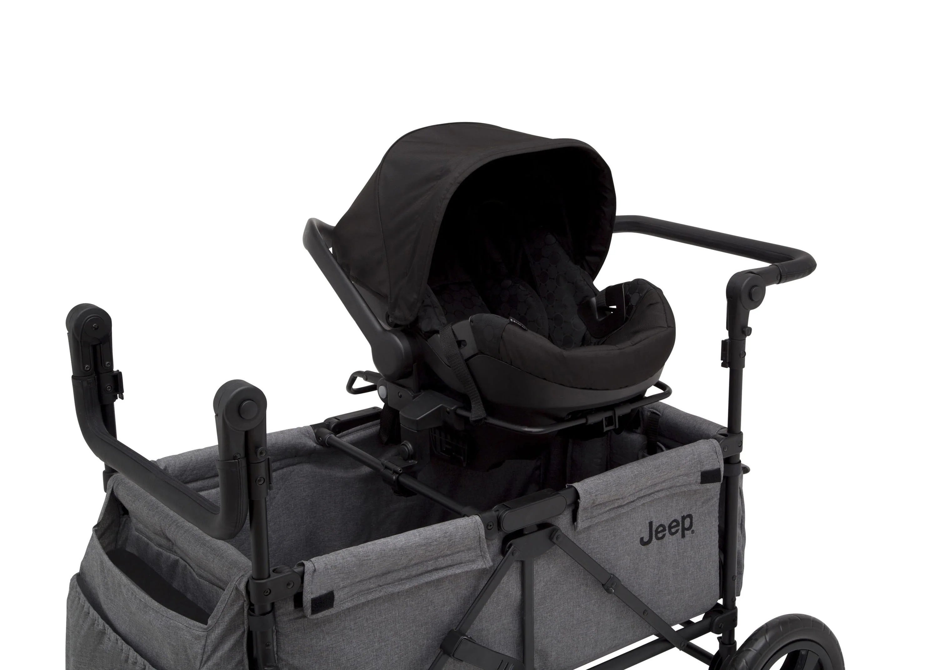 2025 Jeep Wrangler Stroller Wagon de Delta Children – 3 Modos: Portabebés, Cochecito y Carrito, Suspensión, Capota UV, Compatible con Sillas de Auto, Almacenamiento Múltiple, Manillares Ajustables