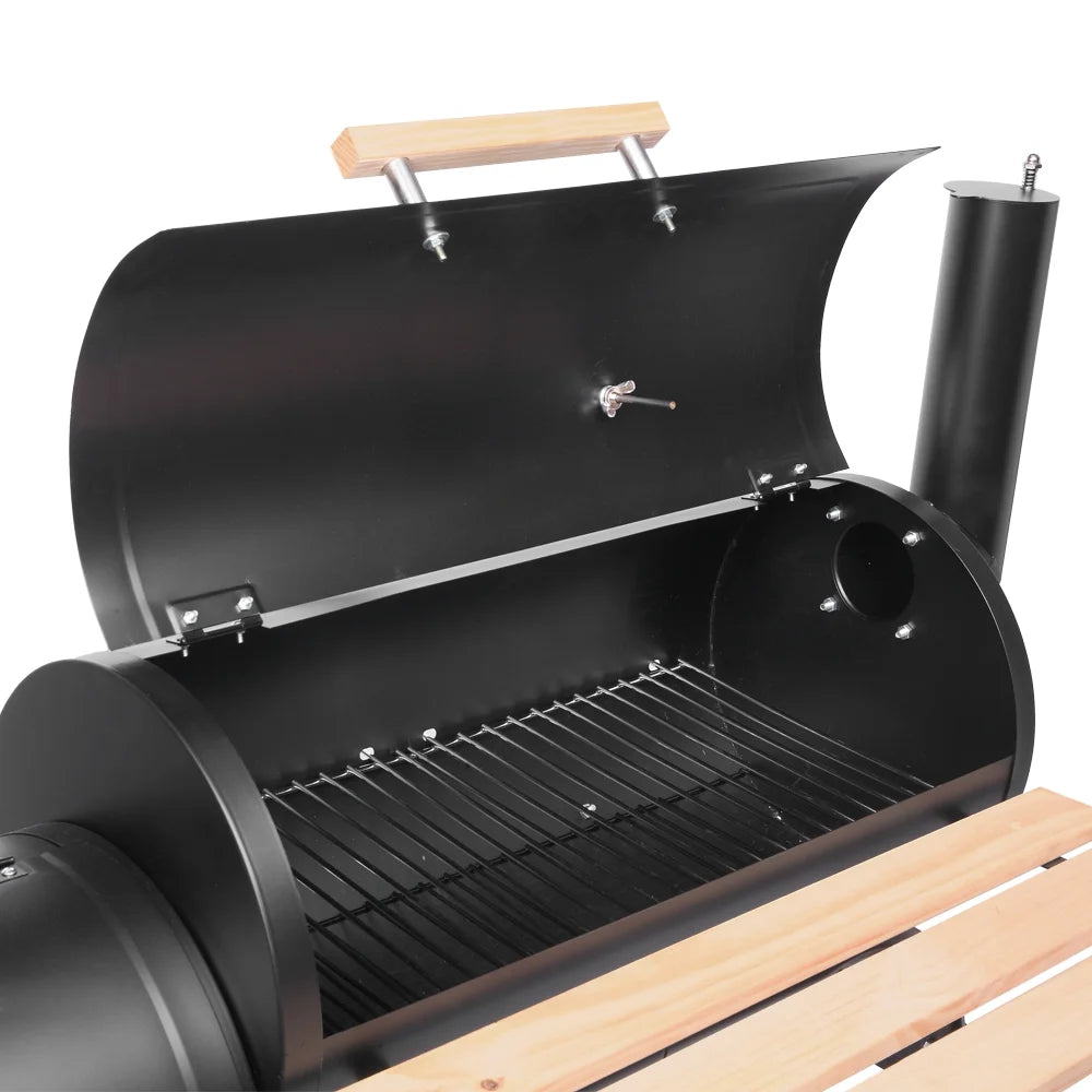 Parrilla portátil de carbón UBesGoo con ahumador lateral de acero para camping, negra.