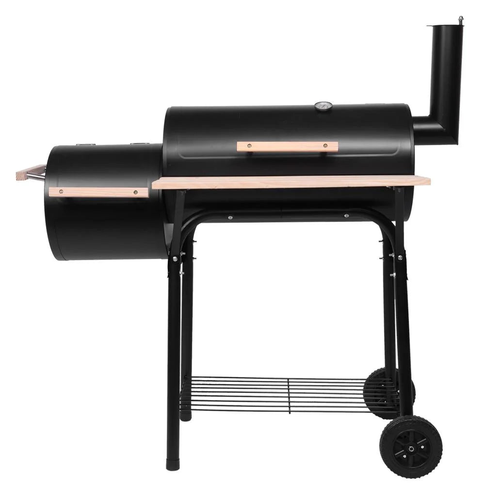 Parrilla portátil de carbón UBesGoo con ahumador lateral de acero para camping, negra.